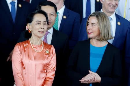 Myanmar State Counselor Aung San Suu Kyi talks with High Representative of European Union Federica Mogherini during the 13th Asia Europe Foreign Ministers Meeting (ASEM) in Naypyitaw, Myanmar, November 20, 2017. REUTERS/Stringer