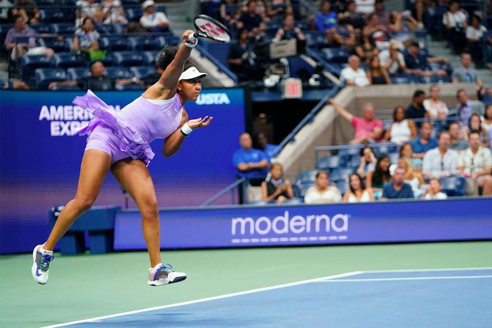 Naomi Osaka, of Japan, serves to Danielle Collins, of the United States, during the first round of the US Open tennis championships, in New York US Open Tennis, New York, United States - 30 Aug 2022