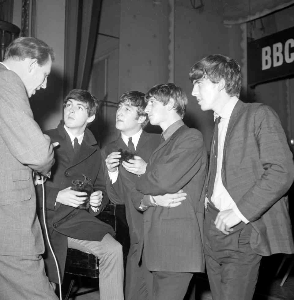 The Beatles being interviewed during a break in recording the BBC radio programme 'Easy Beat'. (l-r) Paul McCartney, John Lennon, Ringo Starr and George Harrison.