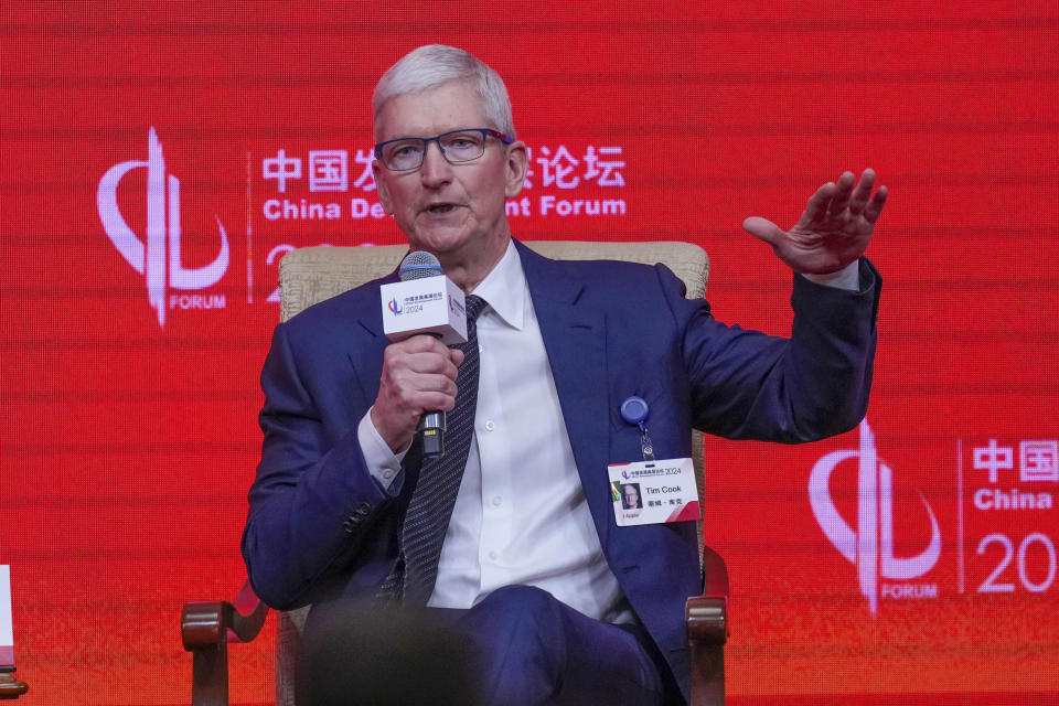 Apple CEO Tim Cook speaks during a parallel session of the China Development Forum at the Diaoyutai State Guest House in Beijing, China, Sunday, March 24, 2024. (AP Photo/Tatan Syuflana)