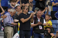 American businessman Todd Boehly, centre, applauds as he attends the English Premier League soccer match between Chelsea and Watford at Stamford Bridge stadium in London, Sunday, May 22, 2022.(AP Photo/Alastair Grant)