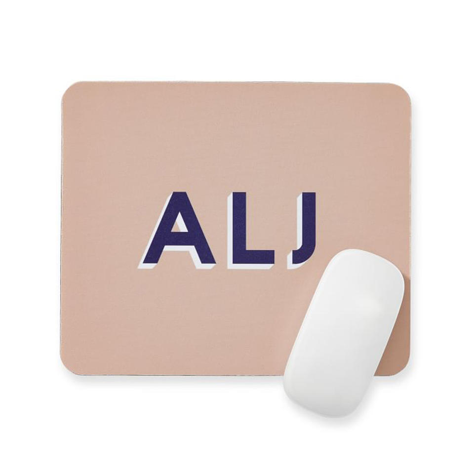 <p>Personalize their workspace with a colorful mouse pad emblazoned with their initials. Working from home just got way better looking. <a href="https://markandgraham.7eer.net/c/249354/267860/4338?subId1=RS29GiftsUnder25ThatStillFeelSpecialmseaverGifGal2600819202011I&u=https%3A%2F%2Fwww.markandgraham.com%2Fproducts%2Fcolorful-mousepad%2F" rel="nofollow noopener" target="_blank" data-ylk="slk:From $19, markandgraham.com;elm:context_link;itc:0;sec:content-canvas" class="link ">From $19, markandgraham.com</a></p>