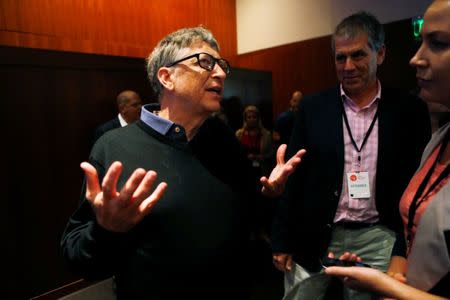 Bill Gates speaks with reporters after speaking at the announcement of the Chan Zuckerberg Initiative to "cure, prevent or manage all disease" by the end of the century during a news conference at UCSF Mission Bay in San Francisco, California, U.S. September 21, 2016. REUTERS/Beck Diefenbach