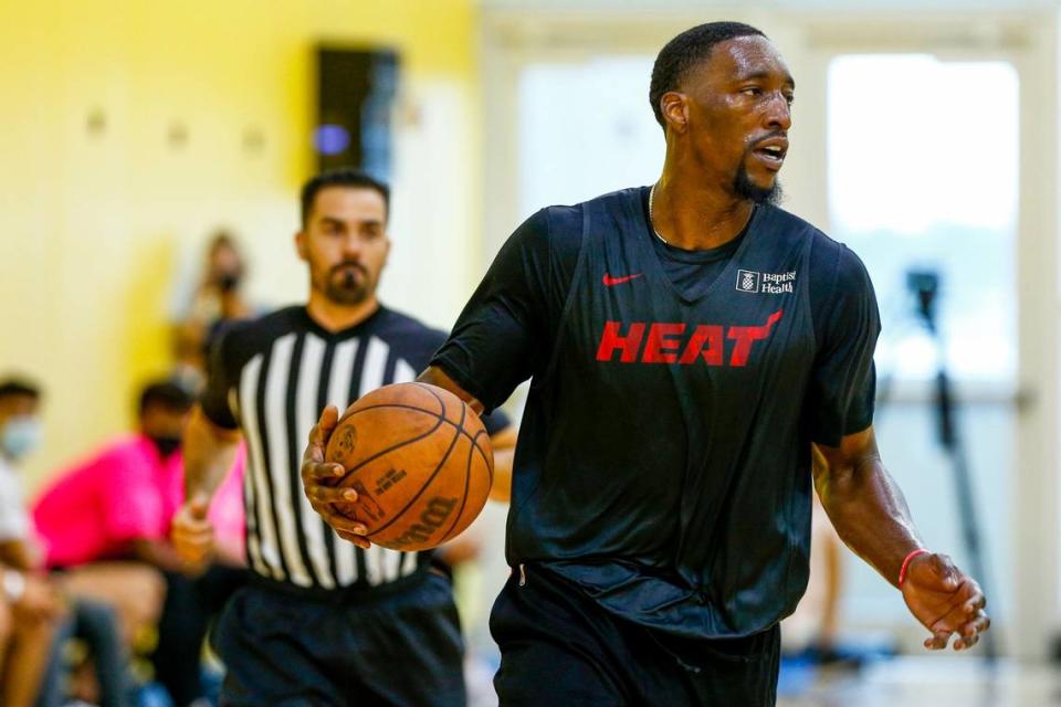 Miami Heat center Bam Adebayo (13) dribbles the ball during a practice scrimmage in front of kids from Miami Dynasty Basketball Camp at FTX Arena in Miami on October 1, 2021.