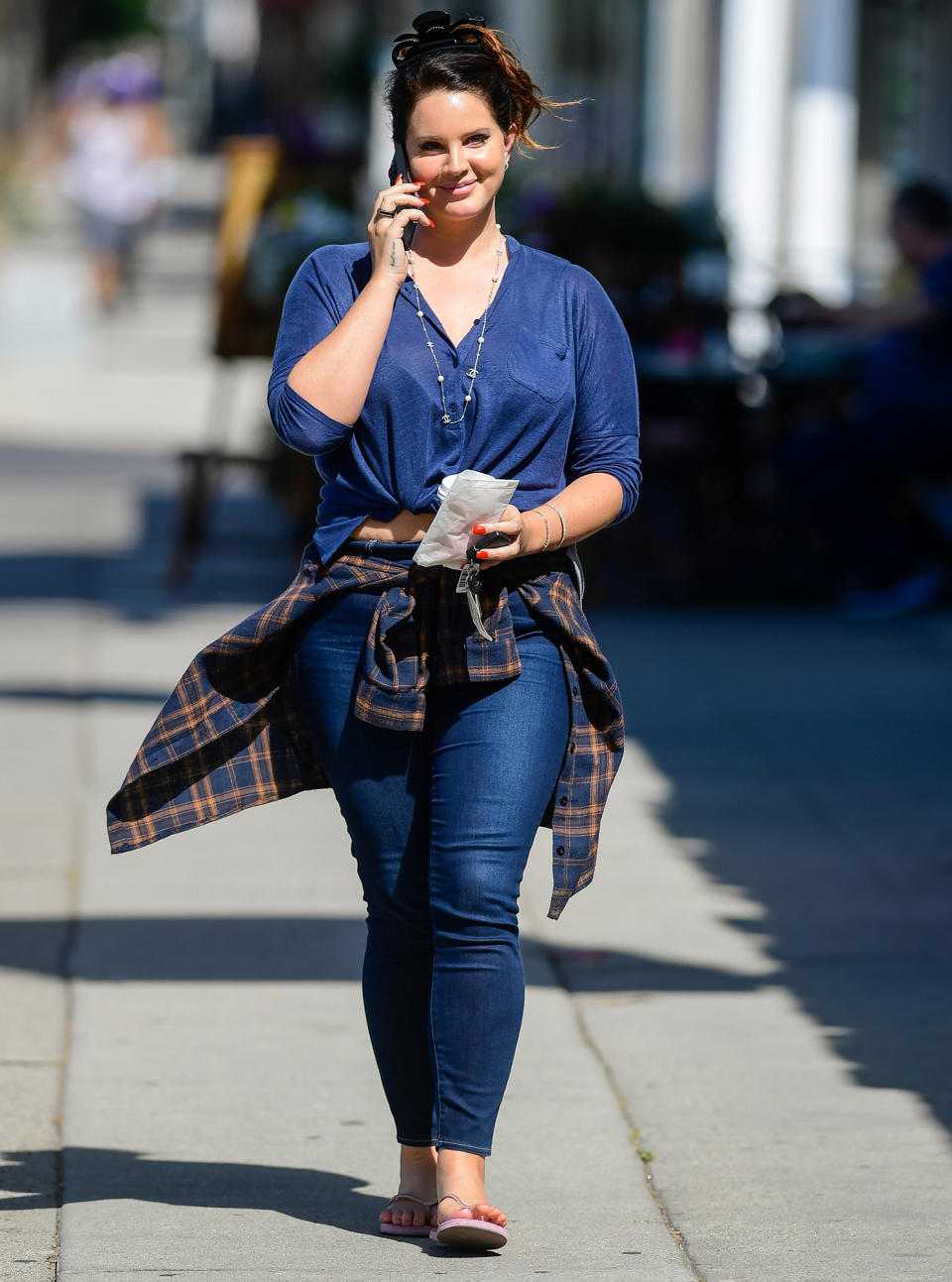 <p>Lana Del Rey wears denim on denim as she runs errands in L.A. on May 18. </p>