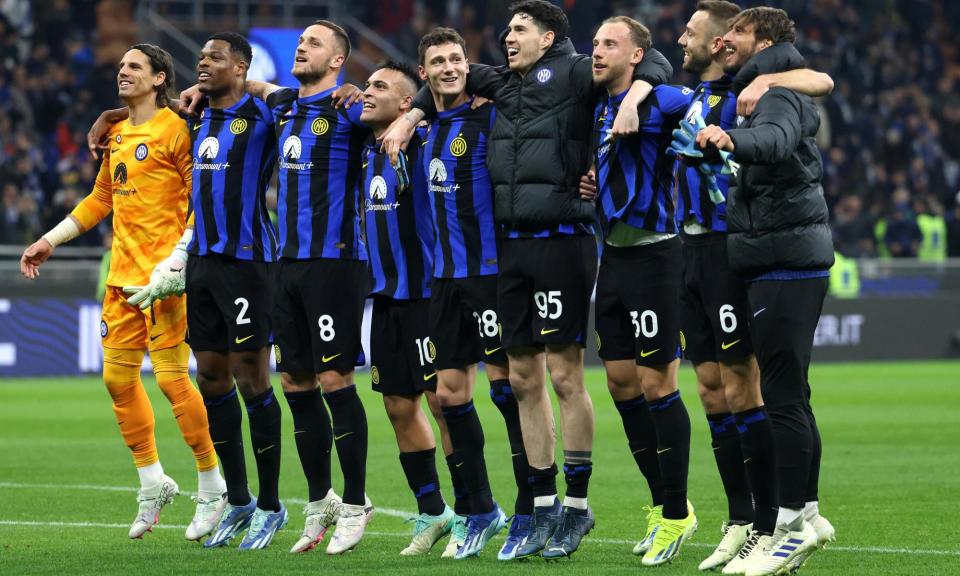 <span>Inter’s players celebrate their victory over <a class="link " href="https://sports.yahoo.com/soccer/teams/juventus/" data-i13n="sec:content-canvas;subsec:anchor_text;elm:context_link" data-ylk="slk:Juventus;sec:content-canvas;subsec:anchor_text;elm:context_link;itc:0">Juventus</a> in the <em>Derby d’Italia.</em></span><span>Photograph: Matteo Bazzi/EPA</span>