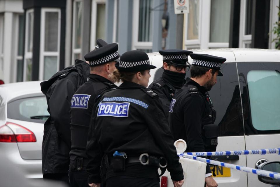 Police in Sutcliffe Street (Peter Byrne/PA) (PA Wire)