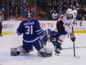 Feb 21, 2019; Toronto, Ontario, CAN; Toronto Maple Leafs goaltender Frederik Andersen (31) makes a save against Washington Capitals forward Tom Wilson (43) at Scotiabank Arena. Washington defeated Toronto. Mandatory Credit: John E. Sokolowski-USA TODAY Sports