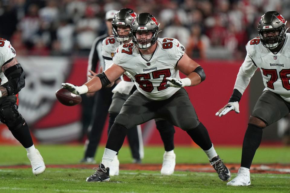 Tampa Bay Buccaneers guard Luke Goedeke (67) protects the pocket during an NFL wild-card football game against the Dallas Cowboys, Monday, Jan. 16, 2023, in Tampa, Fla.