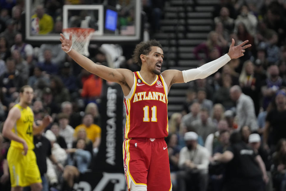 Atlanta Hawks guard Trae Young (11) celebrates during the second half of an NBA basketball game against the Utah Jazz Friday, Feb. 3, 2023, in Salt Lake City. (AP Photo/Rick Bowmer)