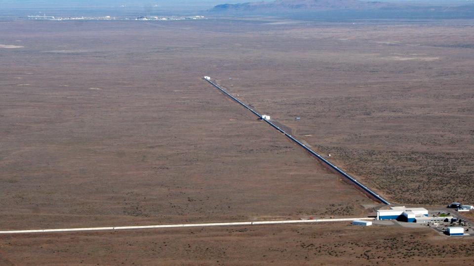 a long pipe-like structure in a desert