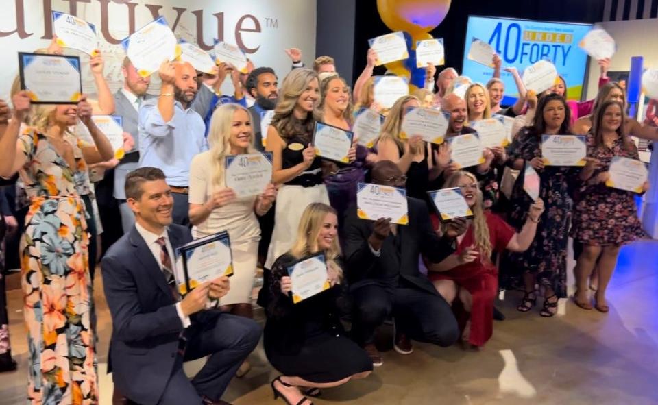 Several of the honorees at the 2023 Volusia-Flagler "40 Under Forty" awards event gather for a group photo on Tuesday, March 21, 2023.  The event is put on every year by The Daytona Beach News-Journal/LocaliQ to recognize outstanding young professionals from throughout Volusia and Flagler counties. The event was hosted by Kenneth Grant Inzpirations at the photo studio's new Cultuvue exhibit space in Daytona Beach.