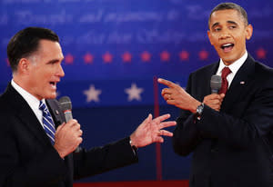 Mitt Romney and Barack Obama | Photo Credits: John Moore/Getty Images News