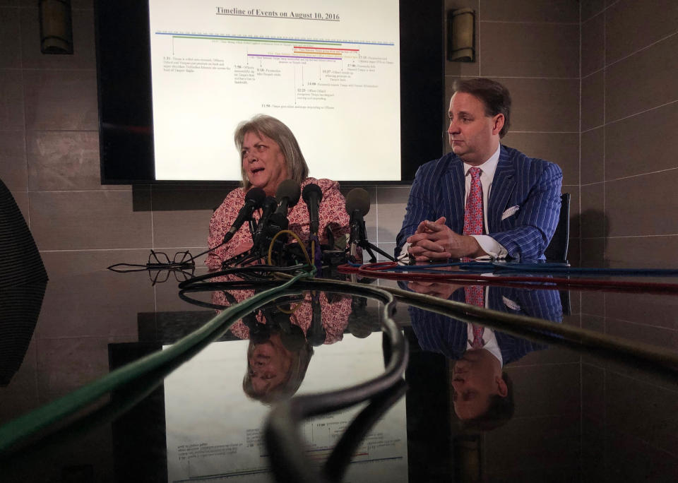 Vicki Timpa and attorney Geoff Henley answer questions from reporters about newly released audio and video recordings related 32-year-old Tony Timpa's 2106 death in police custody during a press conference, Friday, Aug. 2, 2019 in Dallas. Two Dallas police officers involved in the arrest of a 911 caller who died in their custody told commanders they mocked the handcuffed man as part of a "strategy" to get him to respond. (AP Photo/Jake Bleiberg)