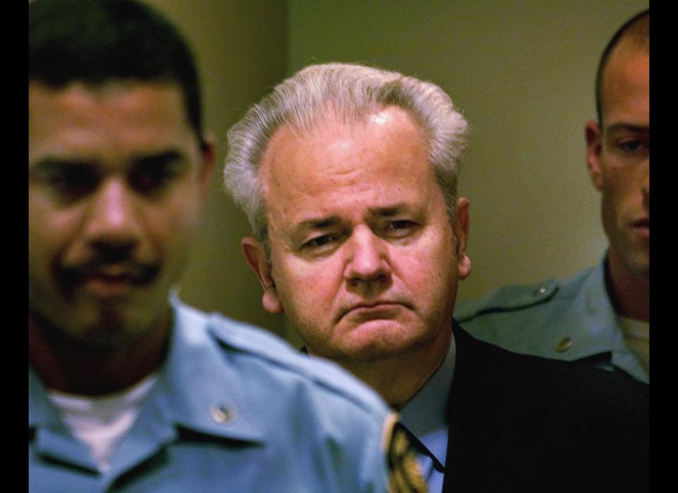 <em>This Tuesday Dec. 11, 2001 file photo shows Slobodan Milosevic, center, as he enters the courtroom to appear before the court of the International Criminal Tribunal for the former Yugoslavia in The Hague. (AP Photo/Paul Vreeker, Pool, File)</em><br><br>    The trial of the former Yugoslav President on charges of masterminding Serb atrocities throughout the wars that tore apart the Balkans in the 1990s dragged on for four years and was eventually aborted without verdicts when he died of a heart attack in his jail cell in 2006. The trial was repeatedly delayed by Milosevic's ill health and propensity for grandstanding in court.