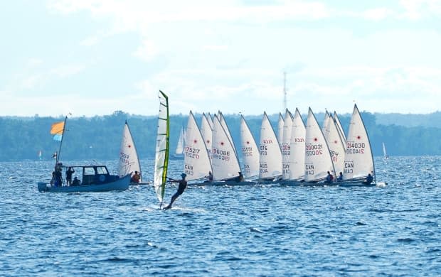 Sailors and windsurfers play in the winds on the Ottawa River on July 21, 2021. (Sean Kilpatrick/The Canadian Press - image credit)