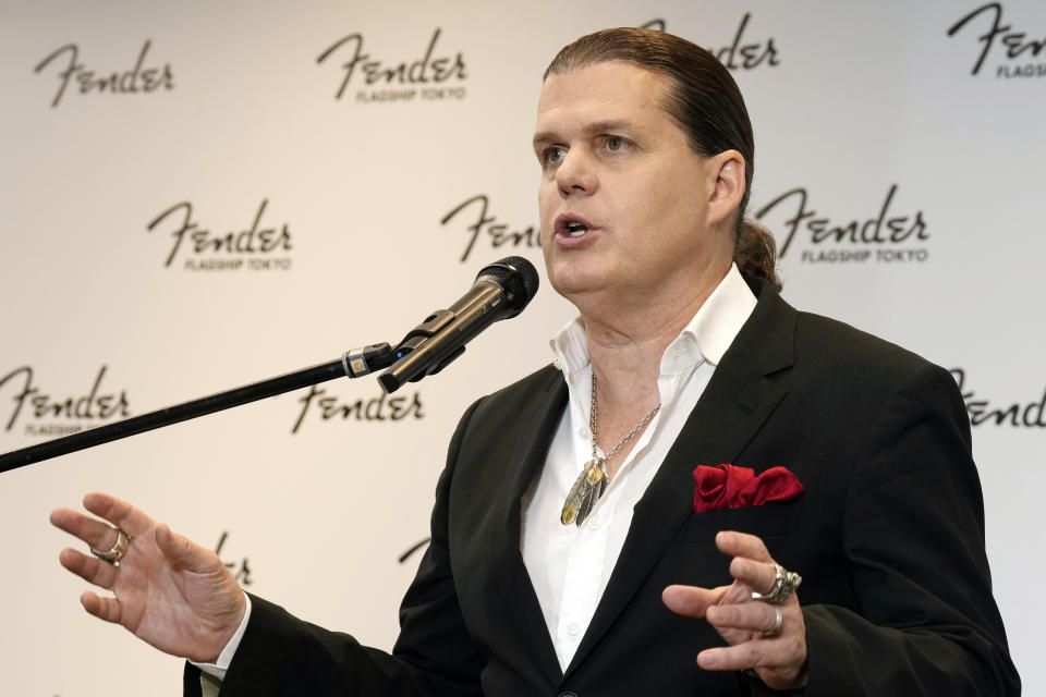 Fender President for Asia-Pacific Edward Cole speaks during the opening ceremony of its Tokyo store Thursday, June 29, 2023. Fender, the guitar of choice for some of the world’s biggest stars from Jimi Hendrix to Eric Clapton, is opening what it calls its “first flagship store” in its 77-year history. (AP Photo/Eugene Hoshiko)