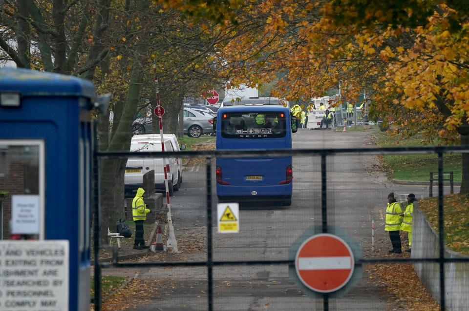 A coach carrying people to the Manston immigration holding facility in Thanet, Kent, earlier this month. (PA)