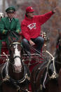 ST. LOUIS, MO - OCTOBER 30: Manager Tony La Russa of the St. Louis Cardinals rides with the Budweiser Clydesdales during a parade celebrating the team's 11th World Series championship October 30, 2011 in St. Louis, Missouri. (Photo by Whitney Curtis/Getty Images)