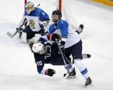 Ice Hockey - Pyeongchang 2018 Winter Olympics - Women's Semifinal Match - U.S. v Finland - Gangneung Hockey Centre, Gangneung, South Korea - February 19, 2018 - Hannah Brandt of U.S. and Mira Jalosuo of Finland (R) in action. REUTERS/Brian Snyder