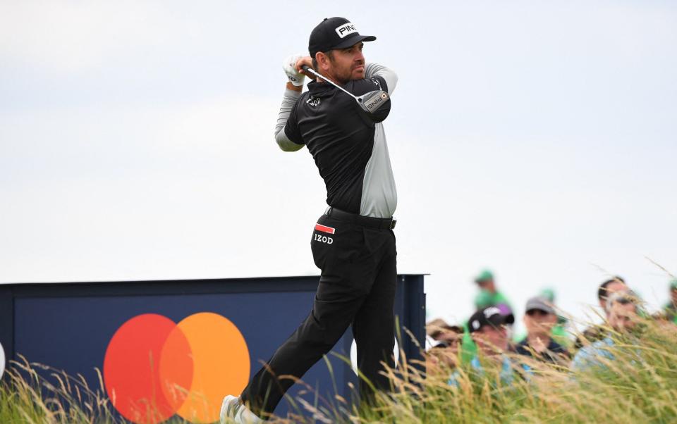 South Africa's Louis Oosthuizen watches his drive from the 9th tee during his first round on day one of The 149th British Open Golf Championship at Royal St George's, Sandwich in south-east England on July 15, 2021. - AFP