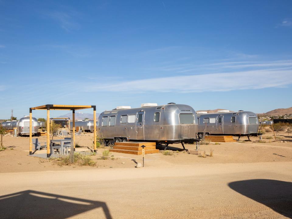 A row of Airstream trailers at Autocamp's Joshua Tree location.