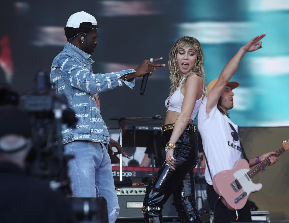 Miley Cyrus performing with rapper Lil Nas X on the Pyramid Stage on the fifth day of the Glastonbury Festival at Worthy Farm in Somerset.