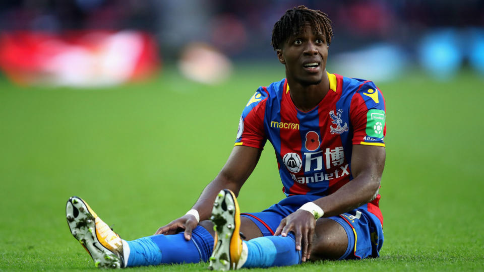 Down and out: Crystal Palace will be without their winger Wilf Zaha for around a month, it has been confirmed