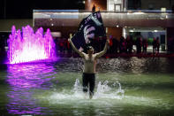 TORONTO, ON - JUNE 13: Toronto Raptors fans celebrate at Toronto City Hall after the team beat the Golden State Warriors in Game Six of the NBA Finals, on June 13, 2019 in Toronto, Canada. (Photo by Cole Burston/Getty Images)