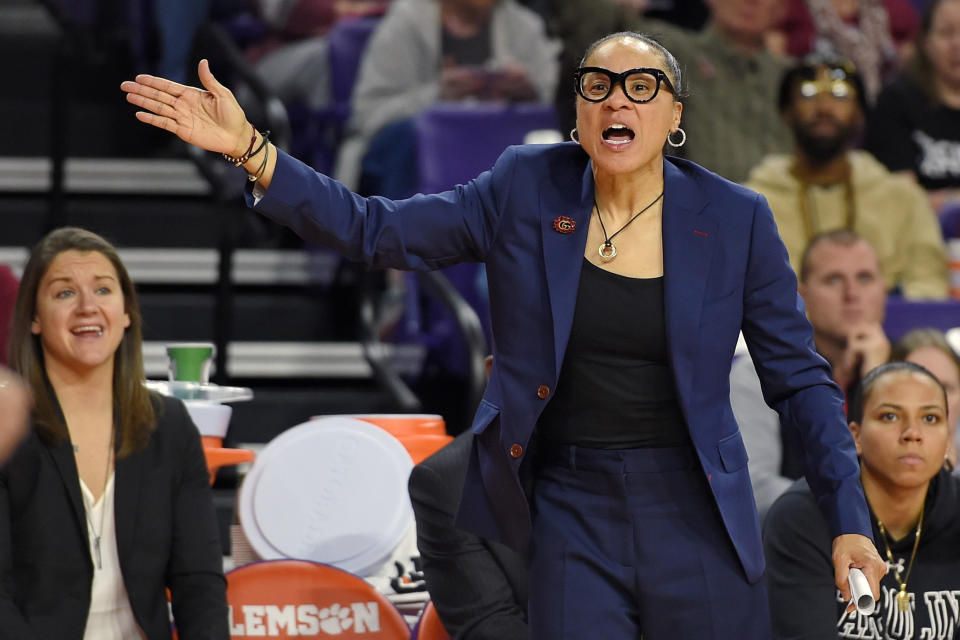 FILE - In this Nov. 24, 2019, file photo, South Carolina head coach Dawn Staley gestures during the second half of an NCAA college basketball game against Clemson in Clemson, S.C. Staley was announced as The Associated Press women's basketball coach of the year Monday, March 23, 2020. (AP Photo/Richard Shiro, File)