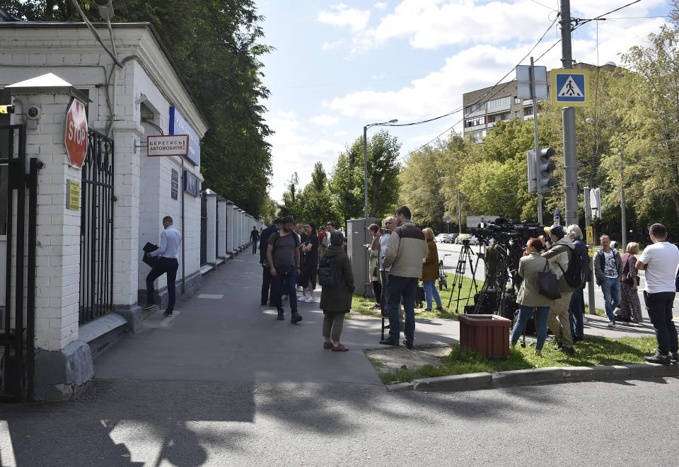 Journalists gather at a hospital where Russian opposition leader Alexei Navalny remained hospitalized, in Moscow, Russia, Monday, July 29, 2019. Navalny remained hospitalized for a second day on Monday after his physician said he may have been poisoned. Details about Navalny's condition were scarce after Navalny was rushed to the hospital Sunday from a detention facility where he was serving a 30-day sentence for calling an unsanctioned protest. (AP Photo)