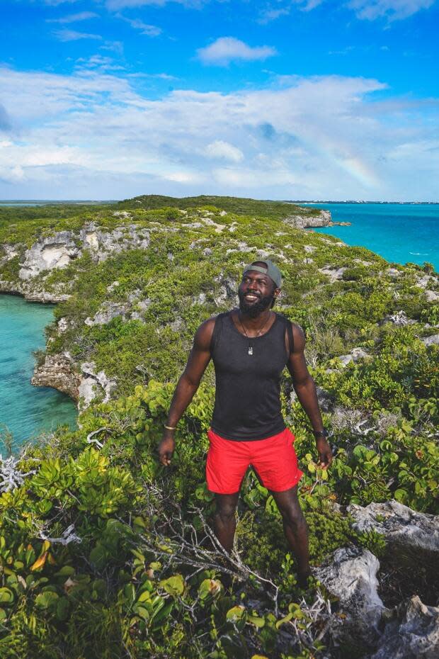 Mario Rigby, a Turks-and-Caicos-born explorer pictured above on the island of Providenciales, will run, hike, cycle, paddle and swim the 225-kilometre distance this April. (Submitted by Mario Rigby - image credit)