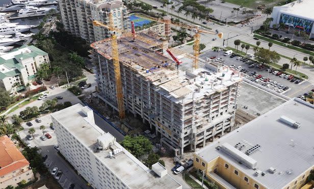 Belmont Village Senior Living’s project in Fort Lauderdale ‘topped out” last week. The 12-story building is expected to be completed in the fall of this year. 