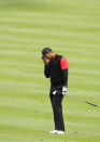 PEBBLE BEACH, CA - FEBRUARY 12: Tiger Woods reacts after hitting his second shot on the 14th hole during the final round of the AT&T Pebble Beach National Pro-Am at Pebble Beach Golf Links on February 12, 2012 in Pebble Beach, California. (Photo by Ezra Shaw/Getty Images)