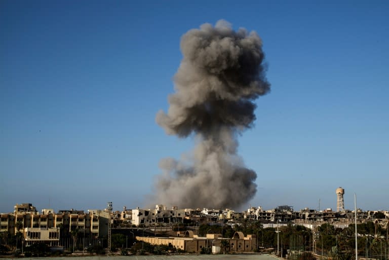 Smoke rises following an airstrike on the Libyan city of Sirte on September 28, 2016