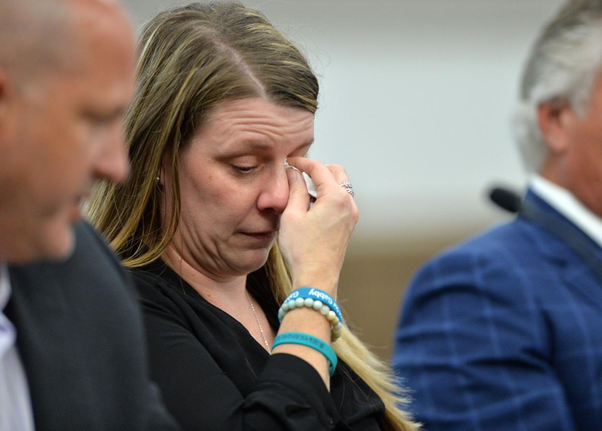 Nichole Schmidt, mother of Gabby Petito, wipes tears during arguments at a hearing Wednesday at the South County Courthouse in Venice. 