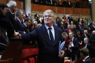 FILE - In this file photo taken Dec.11, 2019, French High Commissioner for Pension Reform Jean-Paul Delevoye arrives before French Prime Minister Edouard Philippe delivers his speech on pension reforms in Paris. The French government suffered a blow Monday as Jean-Paul Delevoye, the key architect of the pension overhaul, resigned over alleged conflicts of interests, on twelfth day of massive transport strikes against the planned changed. (Thomas Samson/Pool via AP, File)