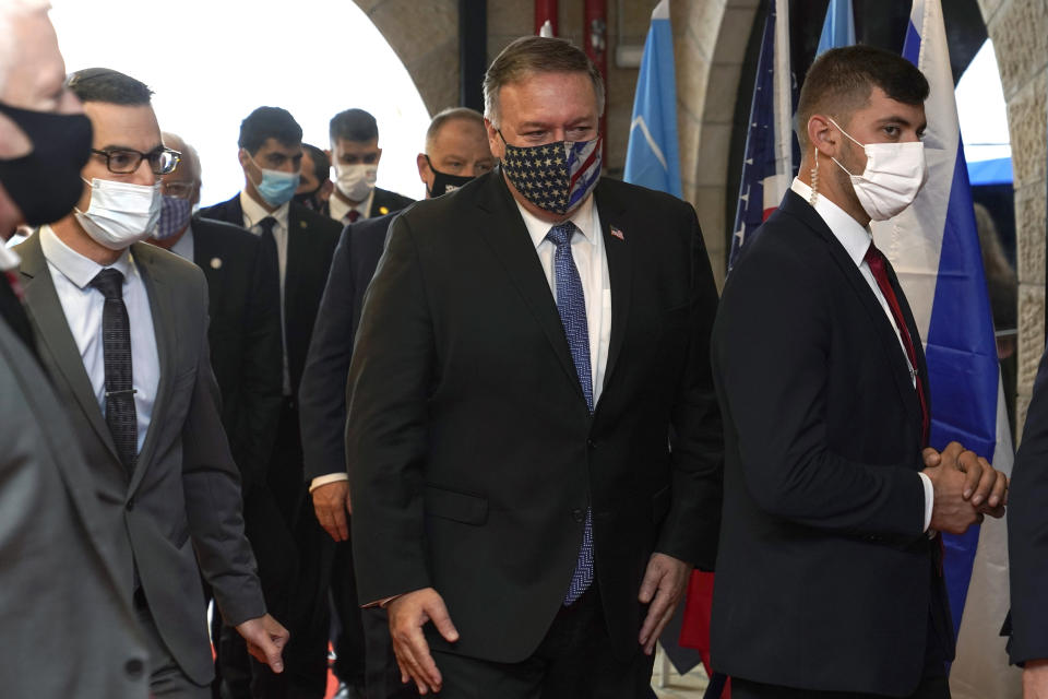 U.S. Secretary of State Mike Pompeo, center, arrives for a tour of the Friends of Zion Museum, Friday, Nov. 20, 2020, in Jerusalem. (AP Photo/Patrick Semansky, Pool)