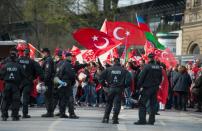 Police cordonning protesters during a "Peace March for Turkey" organized by the new German Turkish Committee in Hamburg in April