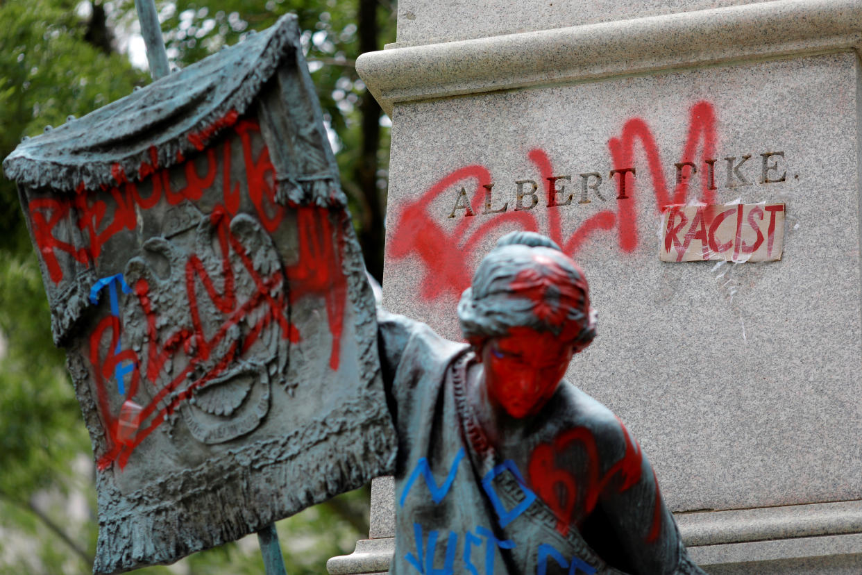 A vandalized statue of Albert Pike, a Confederate general, near Capitol Hill.