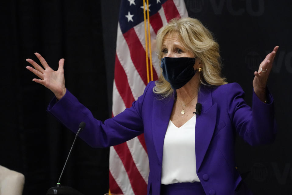 First lady Jill Biden gestures as she speaks during a visit to the Massey Cancer center at Virginia Commonwealth University for a discussion about cancer disparities. in Richmond, Va., Wednesday, Feb. 24, 2021. (AP Photo/Steve Helber)