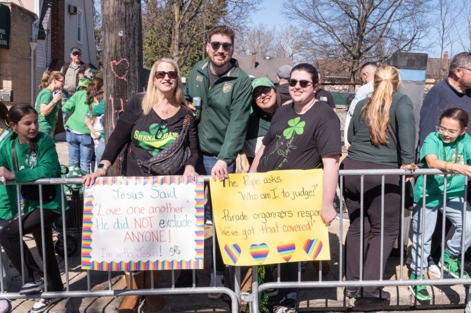 The Buckley family held up signs along the parade route that took swipes at the parade organizers, who again this year excluded LGBT-affiliated groups from marching under their banners. LP Media