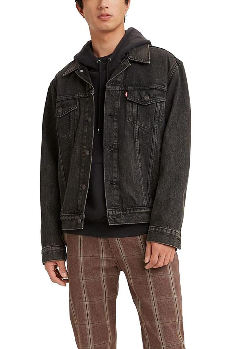 <p><strong>Levi's</strong></p><p>amazon.com</p><p><strong>$53.70</strong></p><p><a href="https://www.amazon.com/dp/B08P54B4Q7?tag=syn-yahoo-20&ascsubtag=%5Bartid%7C10049.g.8292641%5Bsrc%7Cyahoo-us" rel="nofollow noopener" target="_blank" data-ylk="slk:Shop Now" class="link ">Shop Now</a></p><p>A denim jacket is a great wardrobe staple, but the traditional blue can feel unoriginal. Get him a faded black denim one like this to boost his edge factor.</p><p><strong>Glowing Review</strong>: <em>"It had just the right amount of bagginess I wanted and it perfected the outfit I had envisioned. <a href="https://www.amazon.com/gp/customer-reviews/R1O1Z42MXWXI1U/ref=cm_cr_arp_d_rvw_ttl?ie=UTF8&ASIN=B09G7WWFXN&tag=syn-yahoo-20&ascsubtag=%5Bartid%7C10049.g.8292641%5Bsrc%7Cyahoo-us" rel="nofollow noopener" target="_blank" data-ylk="slk:Very happy" class="link ">Very happy</a>!"</em></p>
