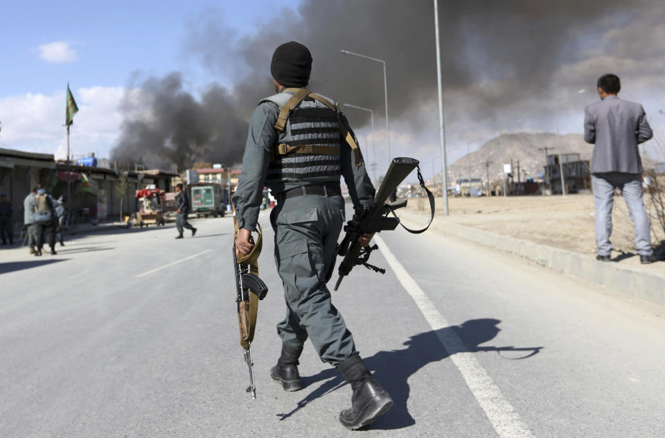 Afghan security forces respond to a suicide attack in Kabul, Afghanistan, Wednesday, March 1, 2017. A pair of suicide bombings, both claimed by the Taliban, struck the Afghan capital, an Afghan official said. (AP Photo/Rahmat Gul)