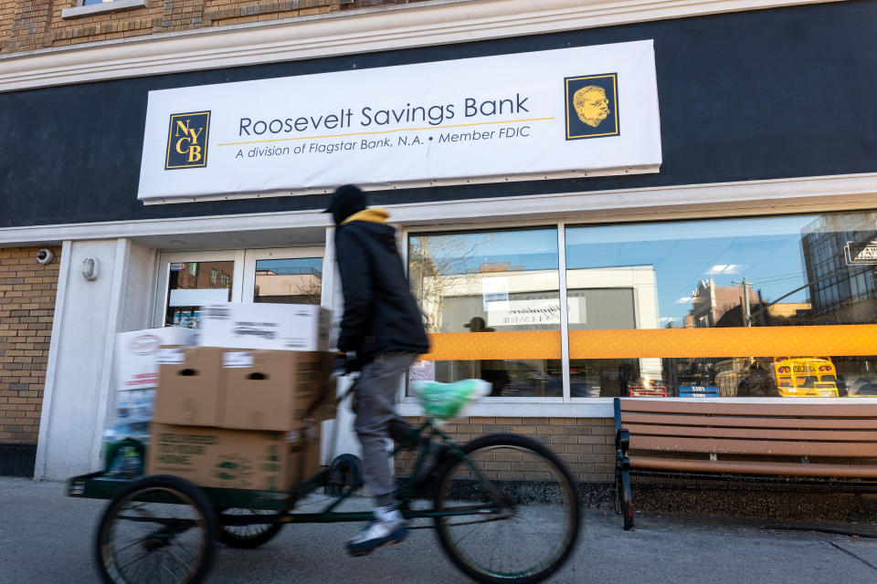 NEW YORK, NEW YORK - FEBRUARY 8: New York Community Bank, known as Roosevelt Bank, stands in Brooklyn, New York City on February 8, 2024. Regional lender New York Community Bancorp has lost about 60% of its value in the past eight days and had its credit rating downgraded to 