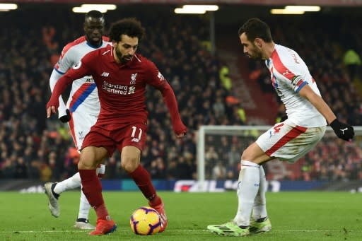 Liverpool's Mohamed Salah ensured the leaders cemented pole position against Crystal Palace