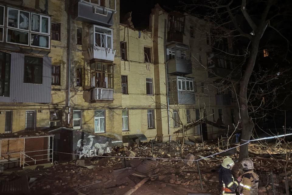 An elderly woman died when a missile struck an apartment building in Kharkiv on Sunday (REUTERS)