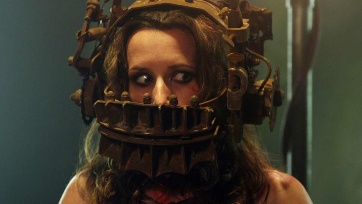  A character gets trapped in a contraption in the Saw film. 