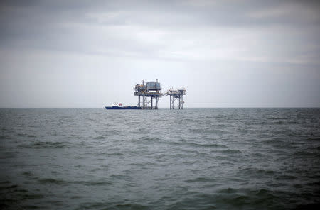 FILE PHOTO: A drilling platform is seen near Breton Island, Louisiana May 3, 2010. REUTERS/Carlos Barria/File Photo