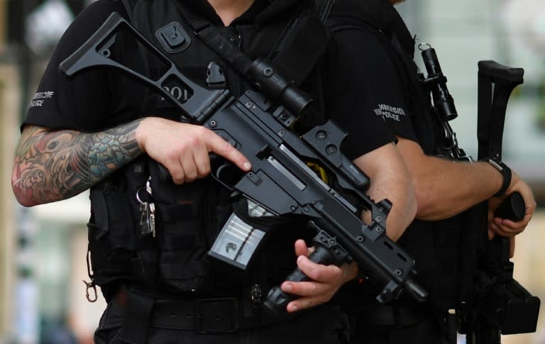 Armed police secure a street in central Manchester, on May 24, 2017